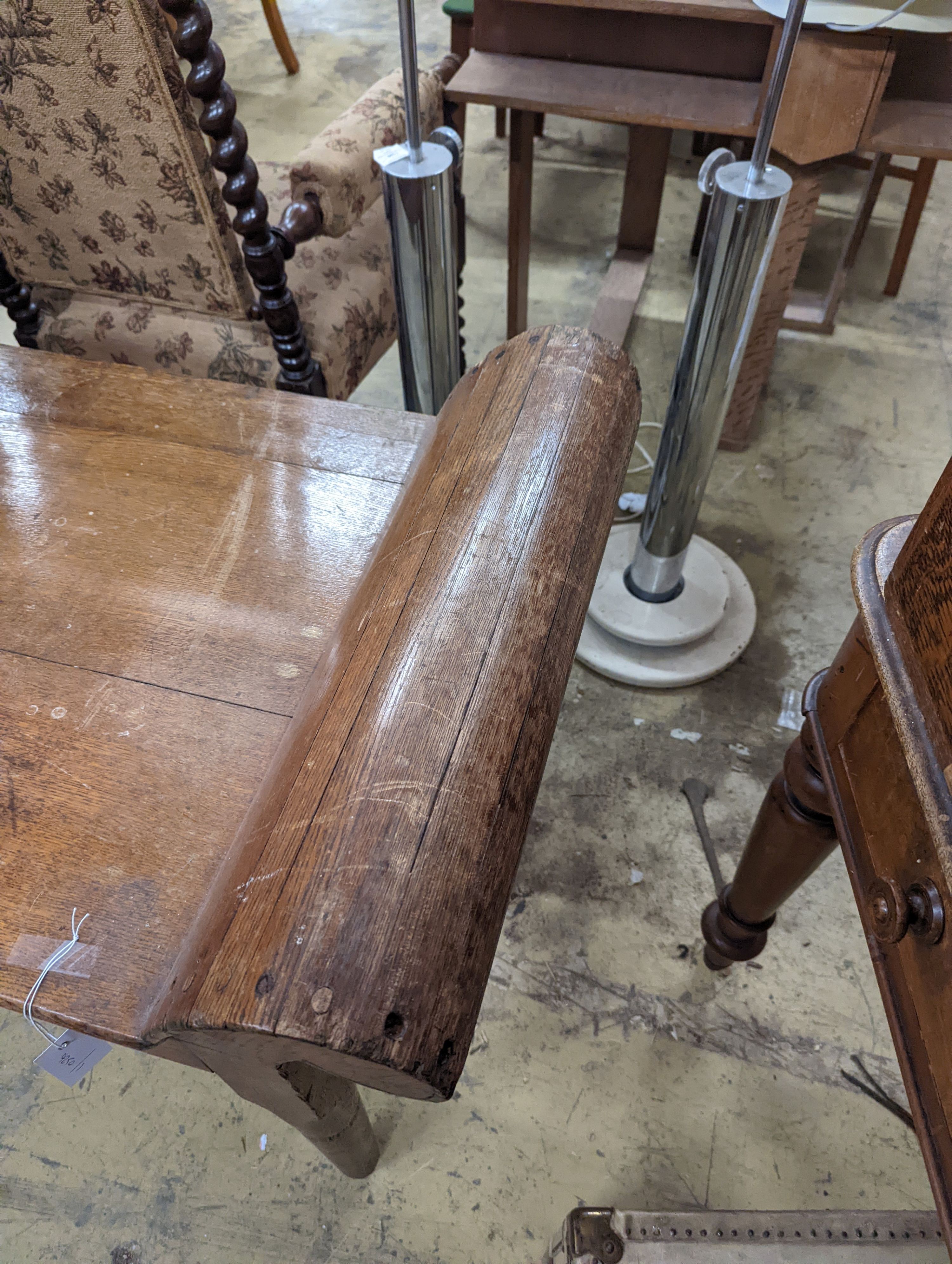 An early 20th century oak examination table, length 180cm, depth 59cm, height 74cm